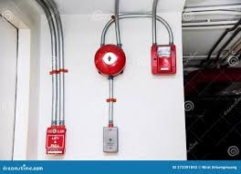Fire alarm bell and conduit with manual stations